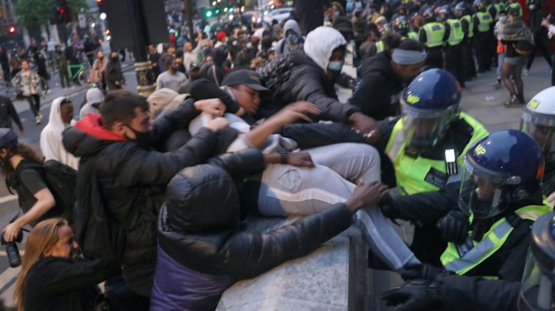 Protesters clash with police during Black Lives Matter ...