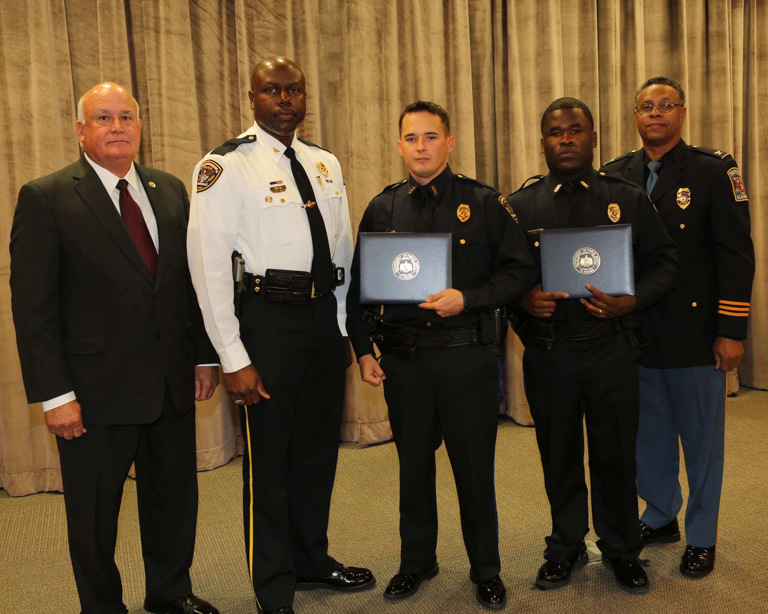 Two DPD officers finish police academy